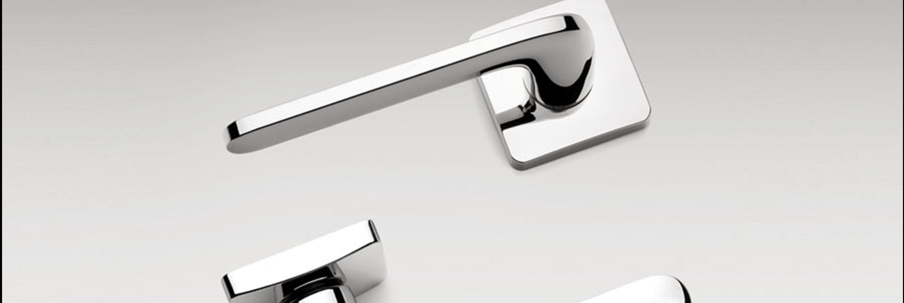 Ælement door handle is on a square rose design
